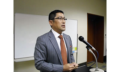 (写真)尾崎氏