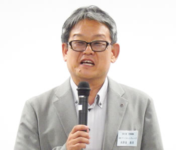 報告する太郎良浩次氏